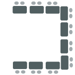 Tables form a horseshoe shape with chairs along the outer perimeter of the tables.